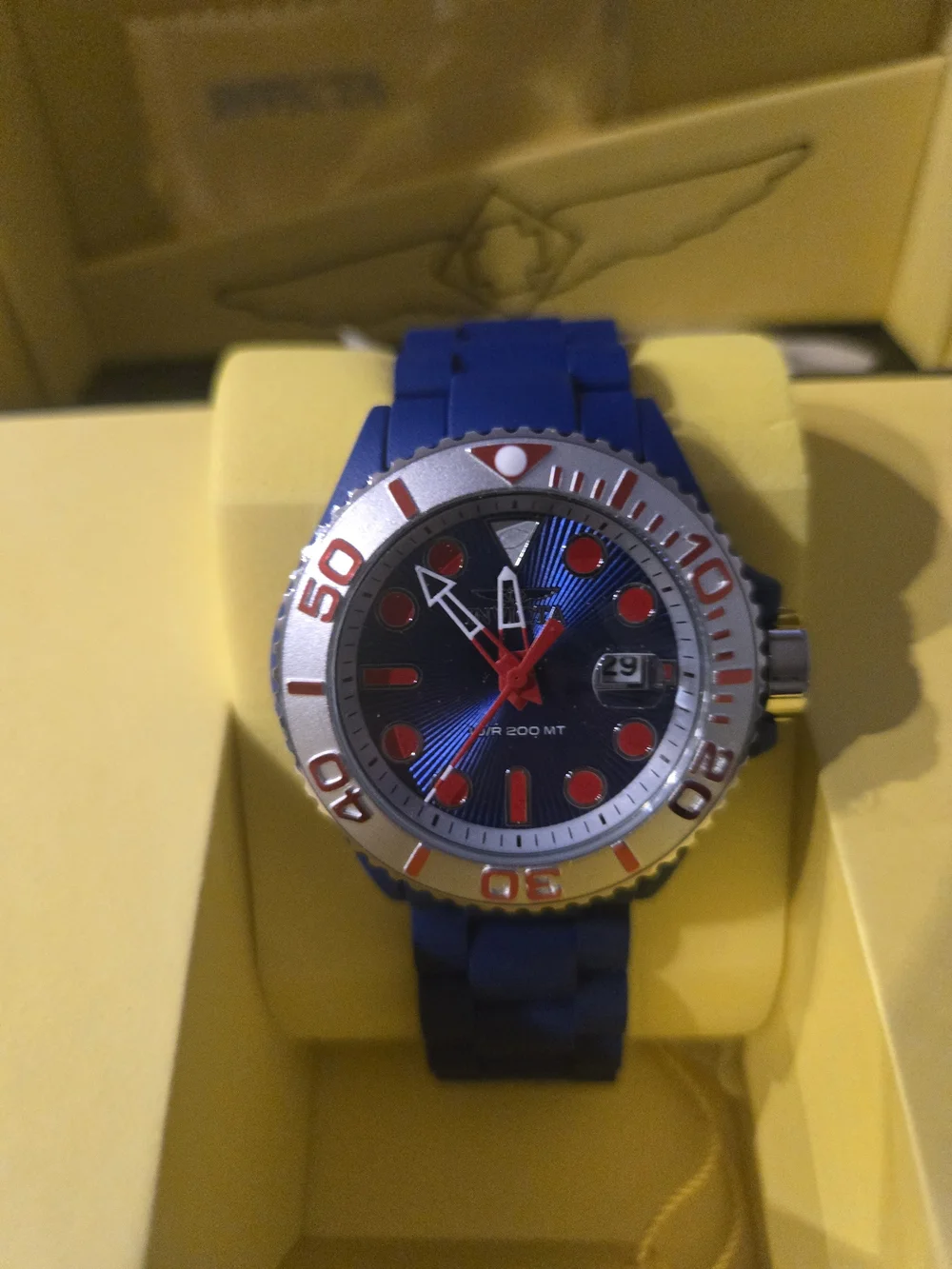 Invicta Blue Dial Men's Watch with Red Accents